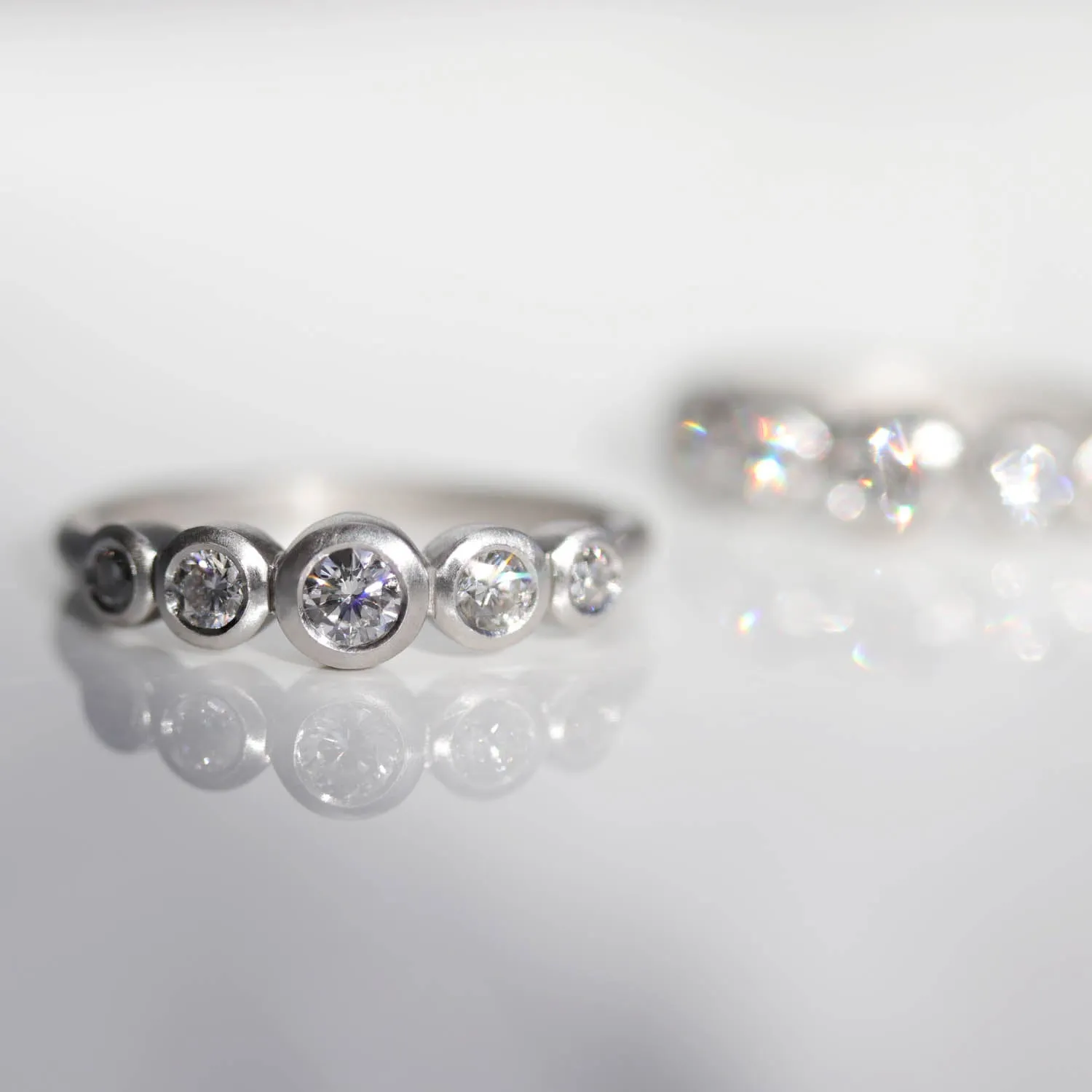 Bezel-set Five Stone Ring