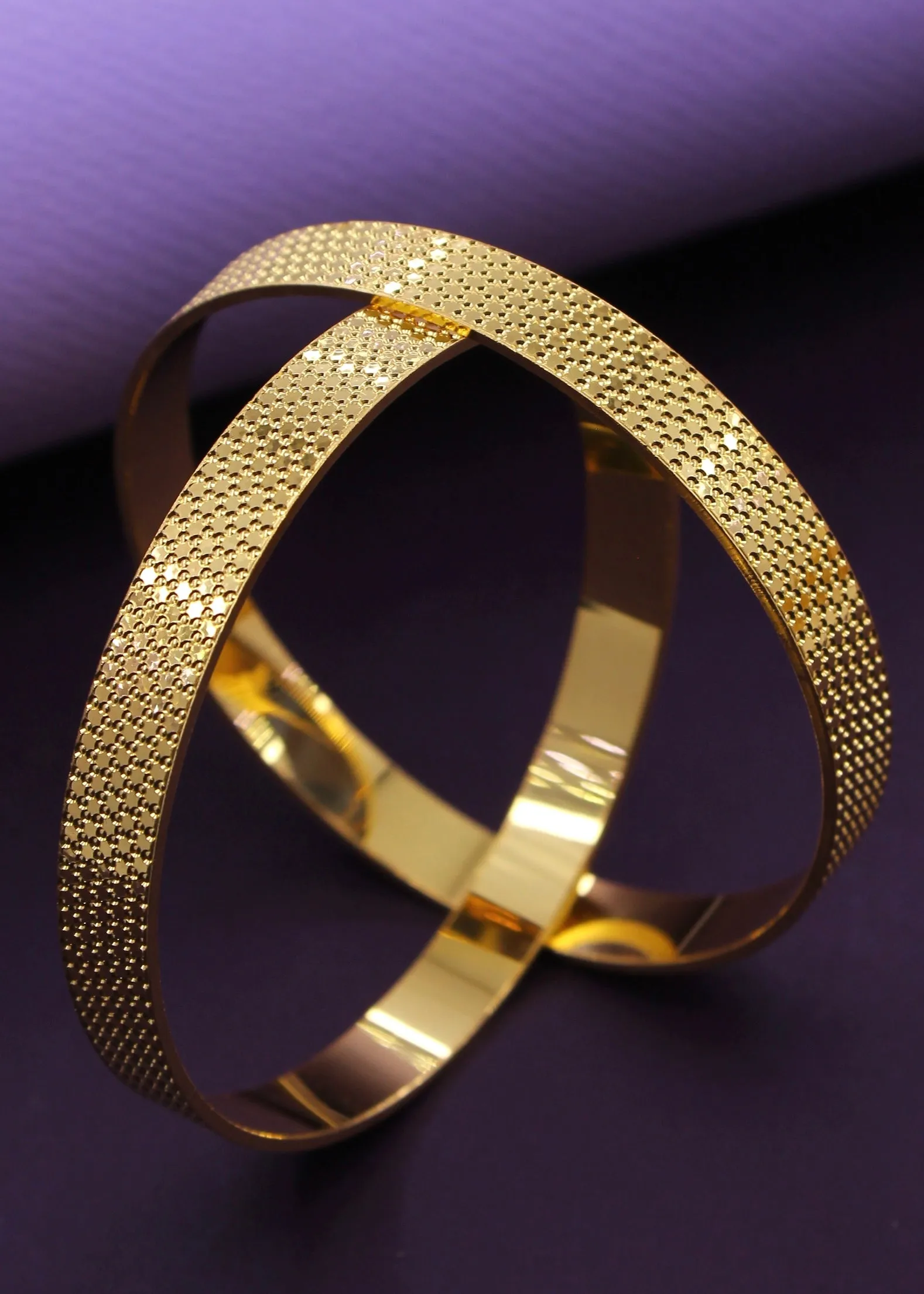 DELICATE DESIGNER GOLDEN BANGLES