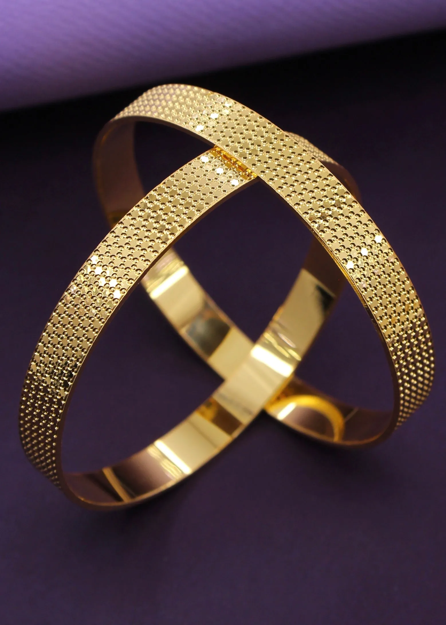 DELICATE DESIGNER GOLDEN BANGLES