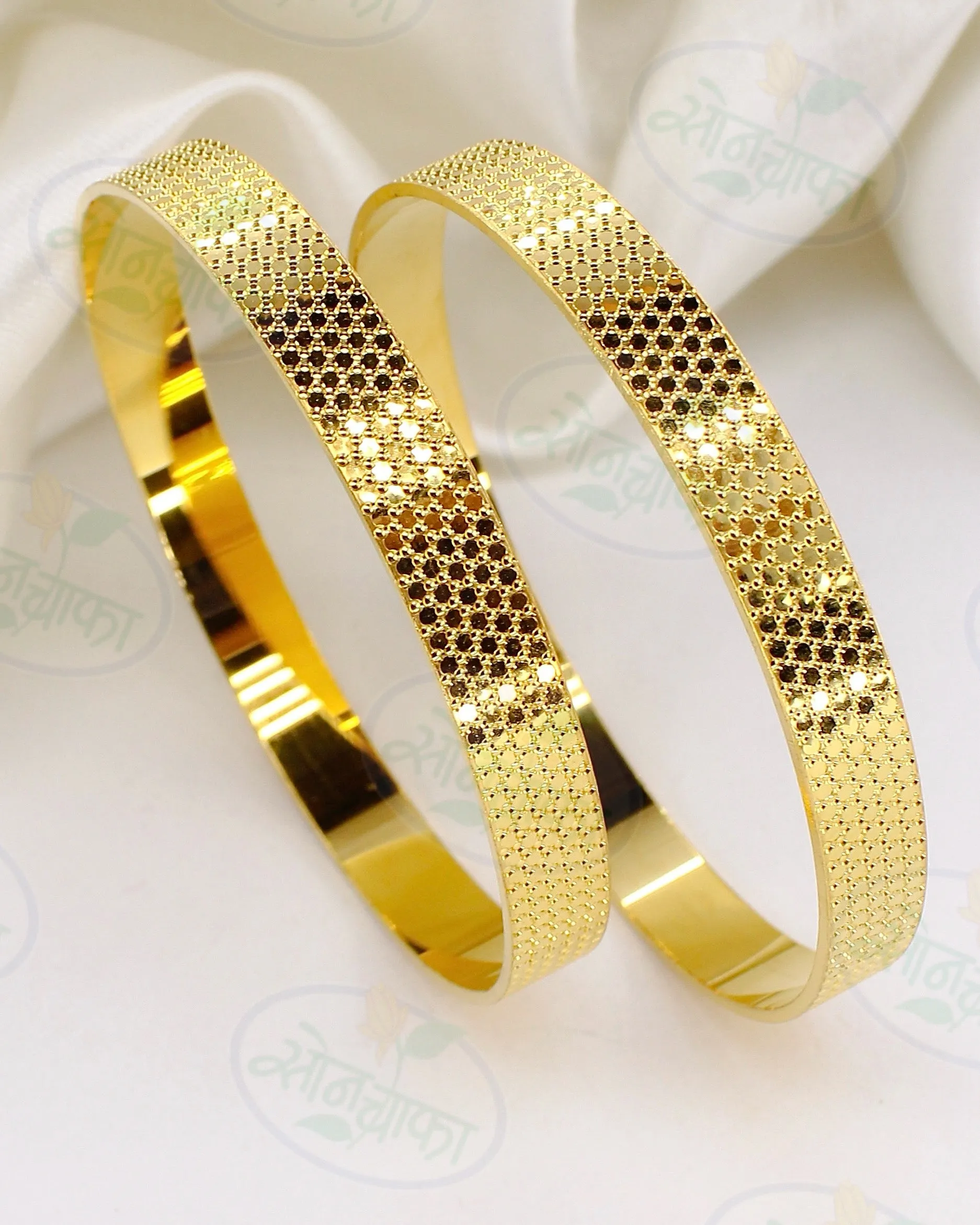 DELICATE DESIGNER GOLDEN BANGLES