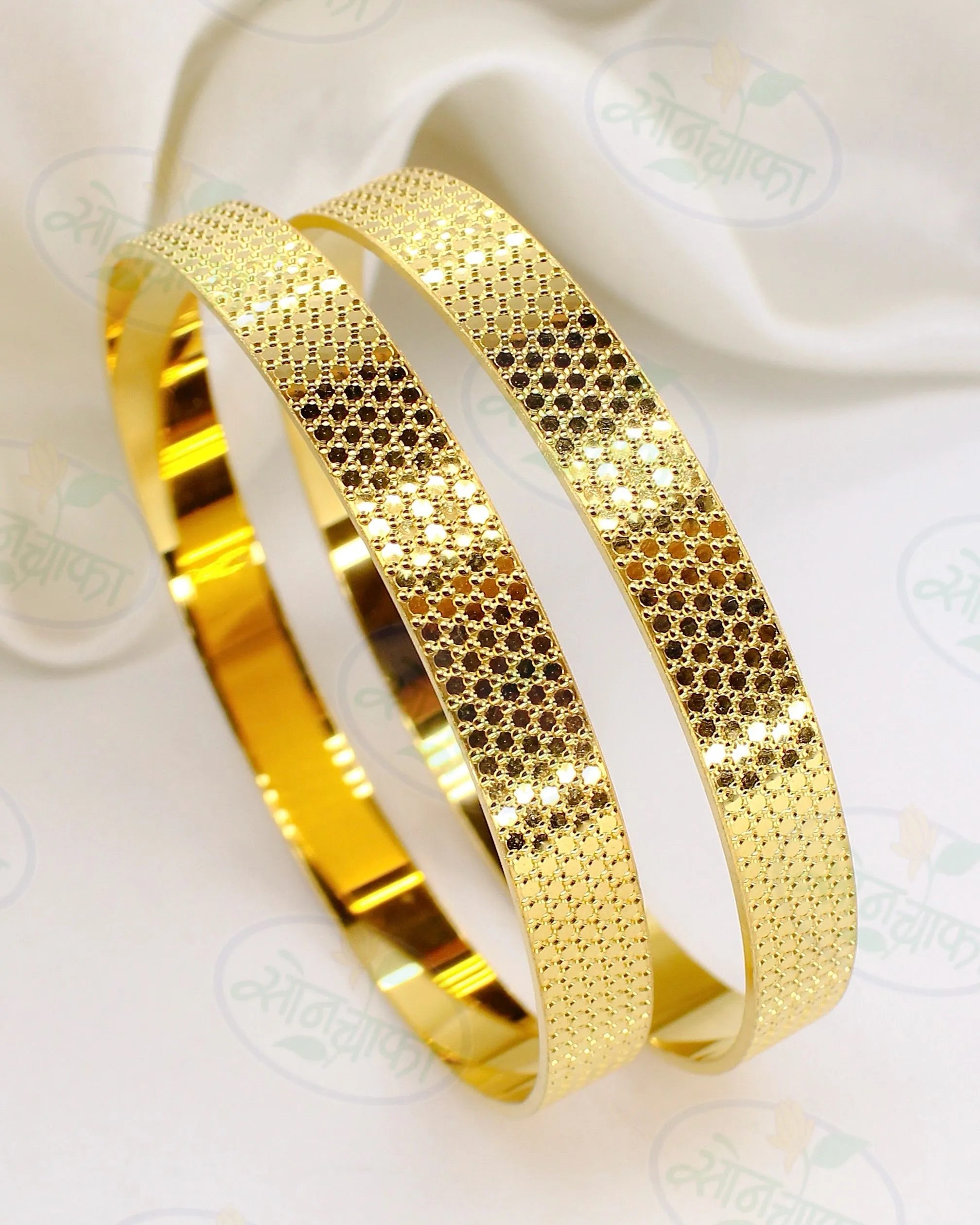 DELICATE DESIGNER GOLDEN BANGLES