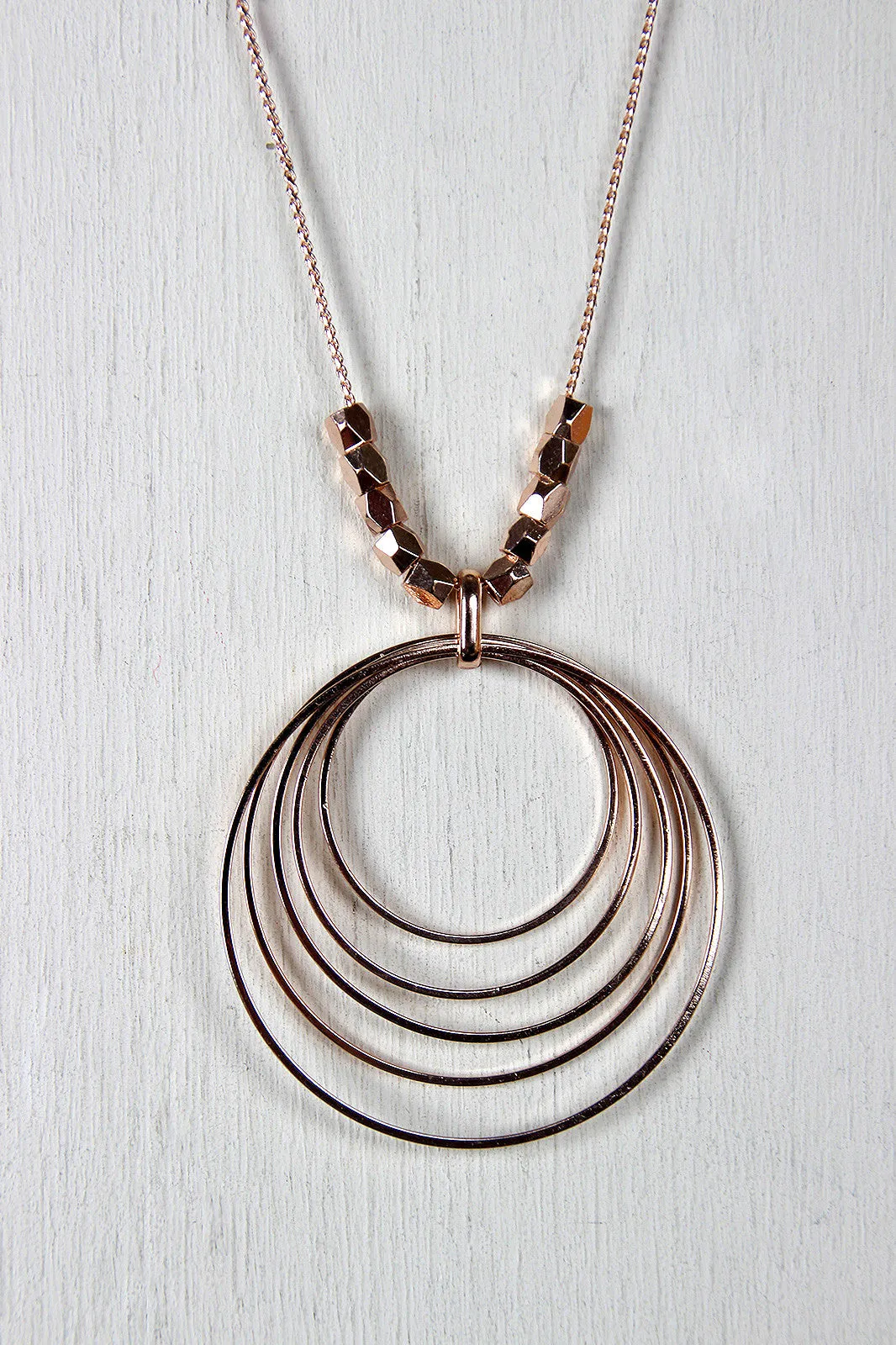 Elliptical Rings and Beads Necklace