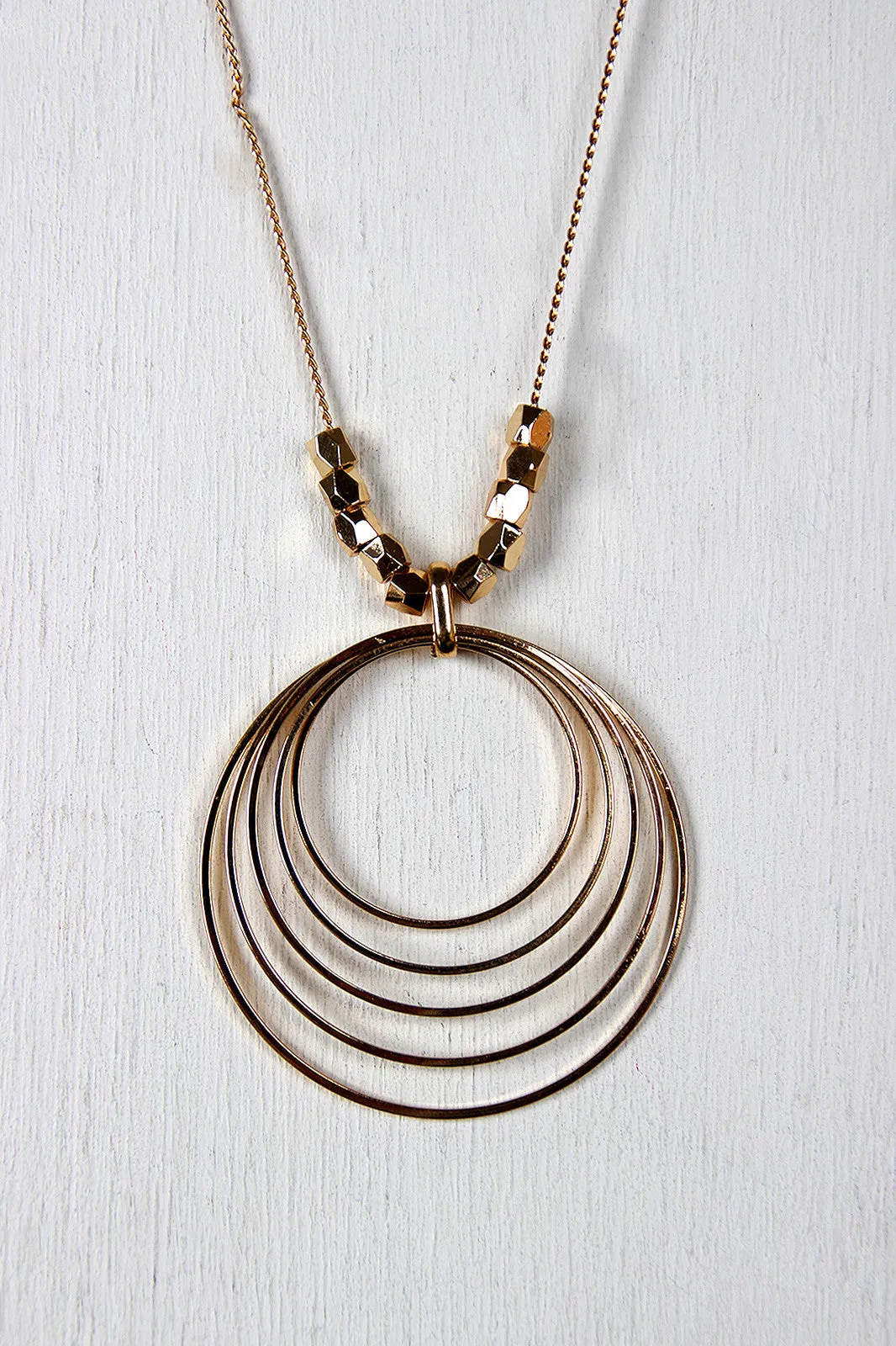 Elliptical Rings and Beads Necklace