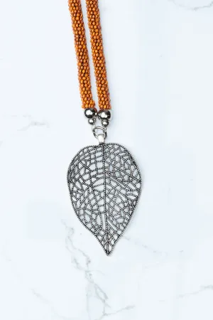 Orange Beaded Leaf Pendant Necklace