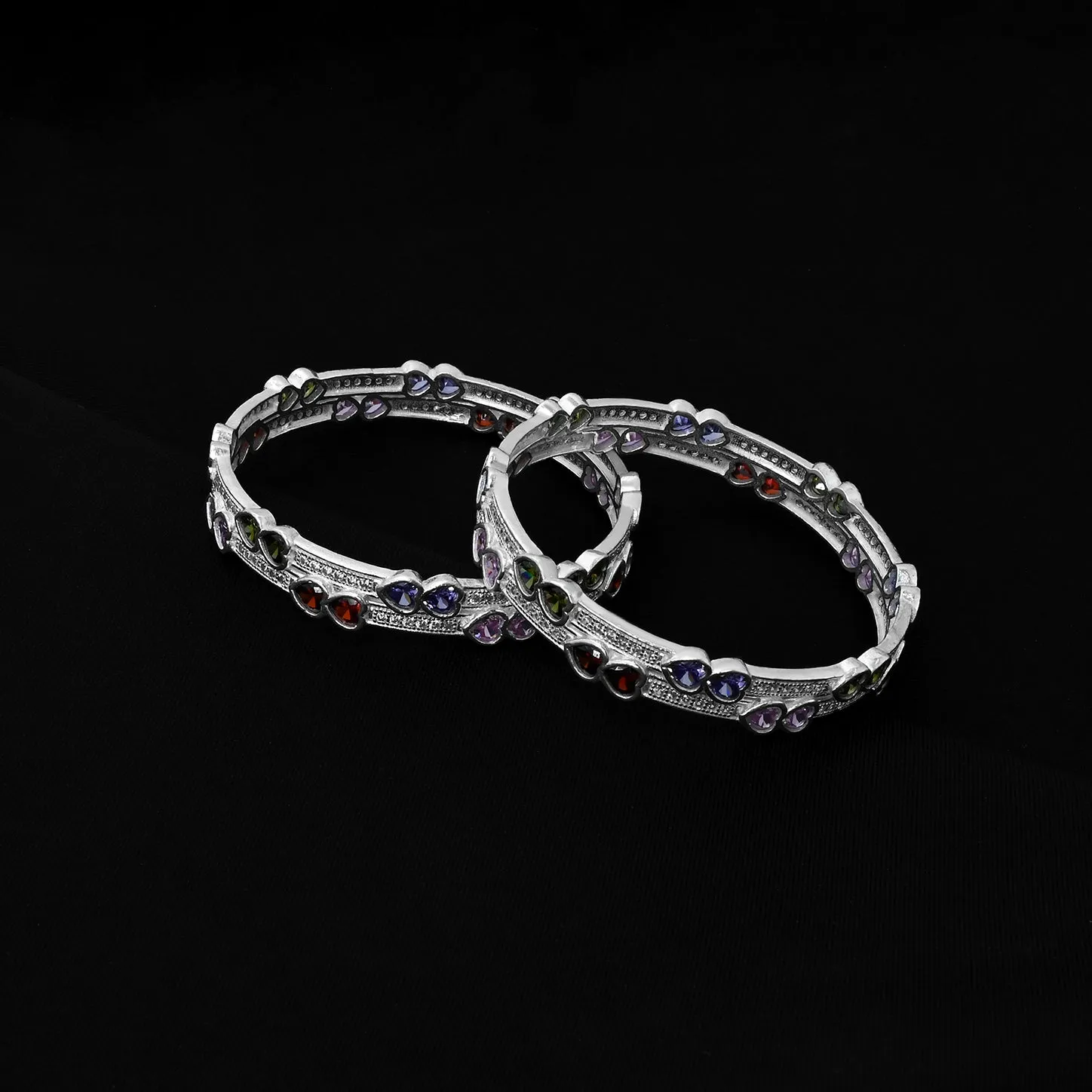 Show Your Love with Silver Bangles Featuring Charming Heart Designs