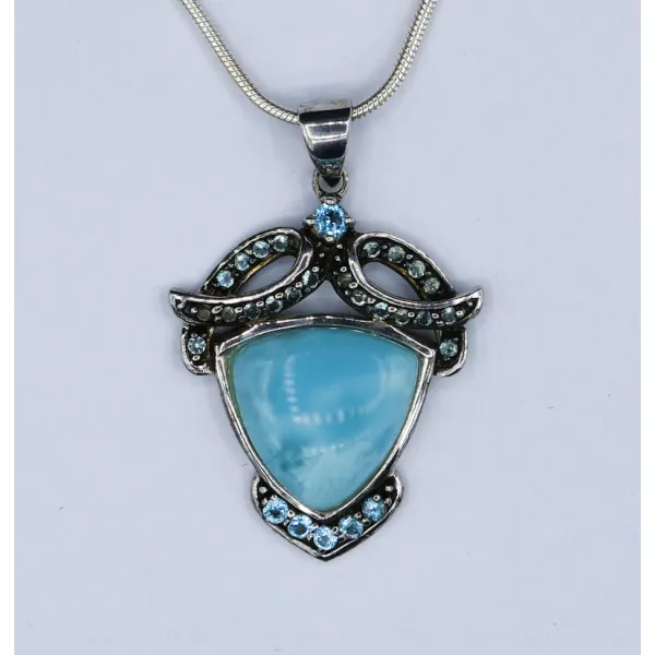 Sterling Silver Pendant with Larimar Stone and 28 Blue Topaz Stones